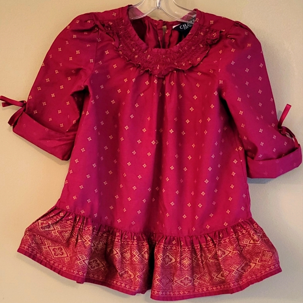 Adorable raspberry colored cotton top with bottom ruffle